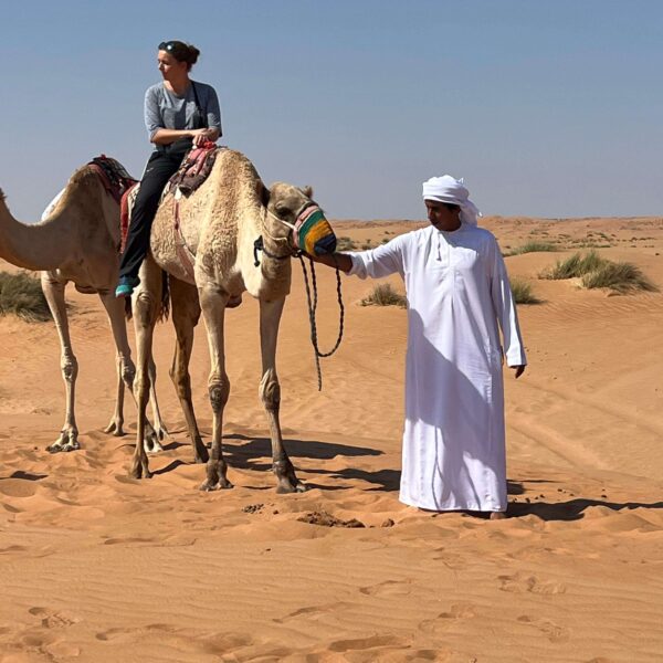 Camel riding Oman desert